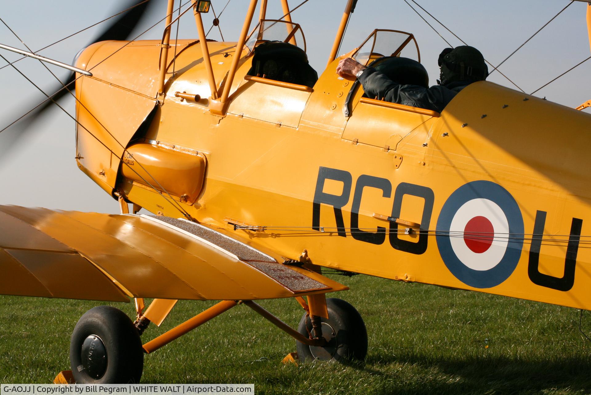 G-AOJJ, 1942 De Havilland DH-82A Tiger Moth II C/N 85877, Pre Flight mag check prior to taking to the skies on a cold December day in 2007.