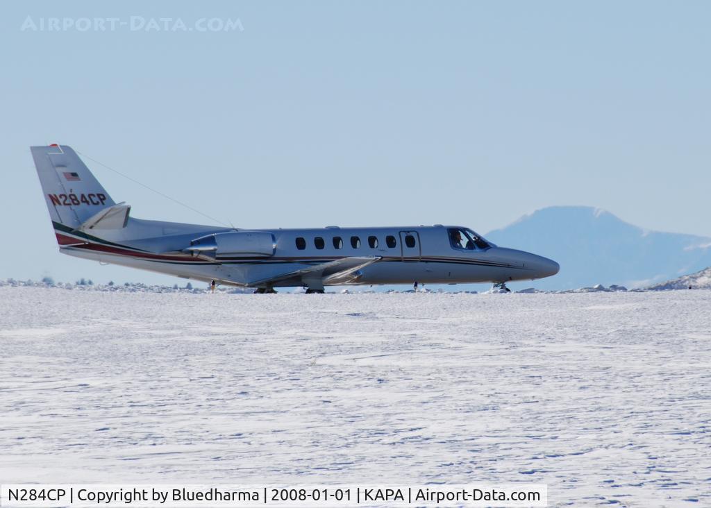 N284CP, 1996 Cessna 560 C/N 560-0358, Taxi to takeoff with Pikes Peak in the distance.