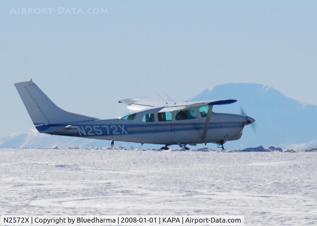N2572X, 1965 Cessna P206 Super Skylane C/N P206-0072, Cleared for takeoff on 17L with Pikes Peak in the distance.