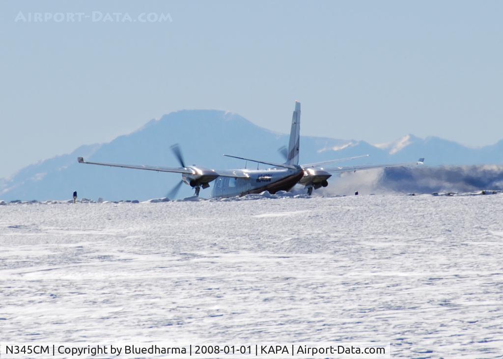 N345CM, 1977 Rockwell International 690B C/N 11402, Takeoff on 17L with Pikes Peak in the distance.