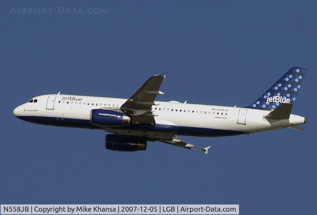 N558JB, 2003 Airbus A320-232 C/N 1915, Song Sung Blue on short final.