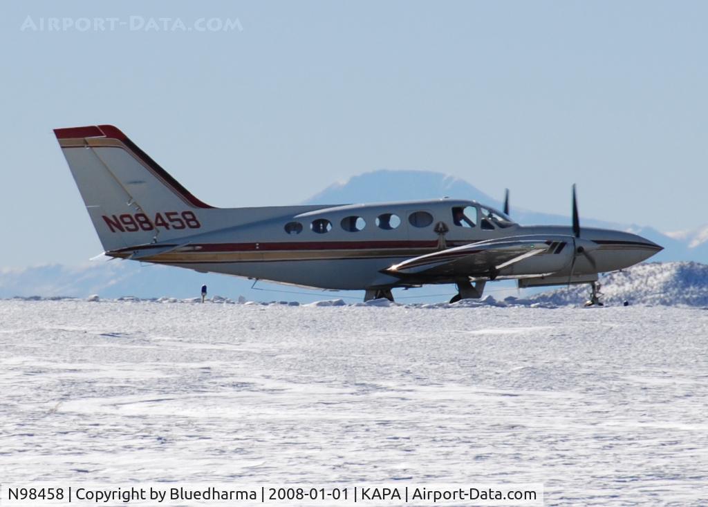 N98458, 1975 Cessna 421C Golden Eagle C/N 421C0051, Cleared for takeoff on 17L. Pikes Peak in the distance.