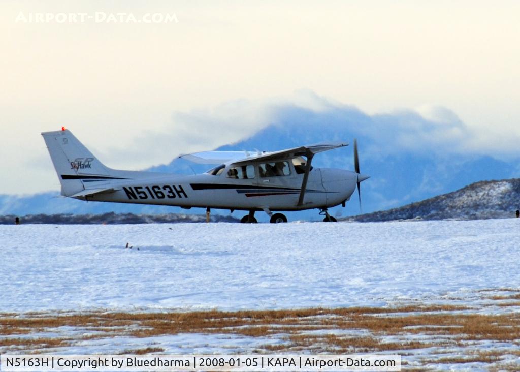 N5163H, 2001 Cessna 172S C/N 172S8933, Cleared for takeoff on 17L. Pikes Peak in the distance.