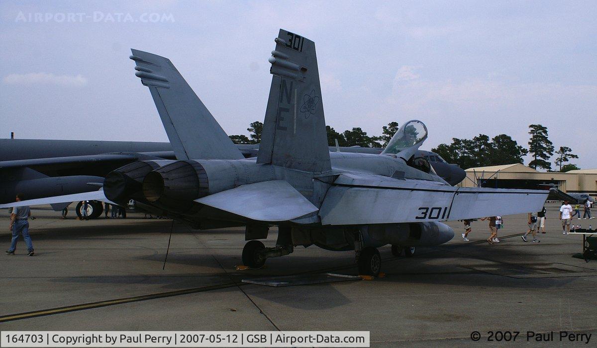 164703, McDonnell Douglas F/A-18C Hornet C/N 1142, For such a short hop, no need for external fuel tanks.  If you took a lokk at them, they had been converted to cargo pods.