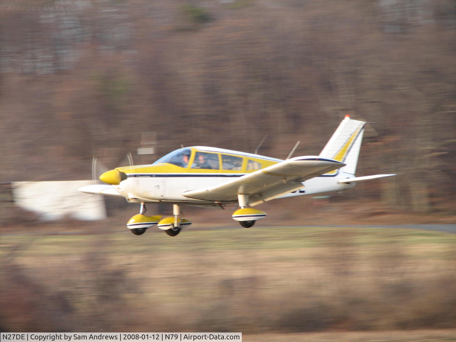 N27DE, 1969 Piper PA-28-180 C/N 28-5348, just before touchdown.  Too much speed in this picture it didn't turn out like I had hoped.  The landing was a very good one.