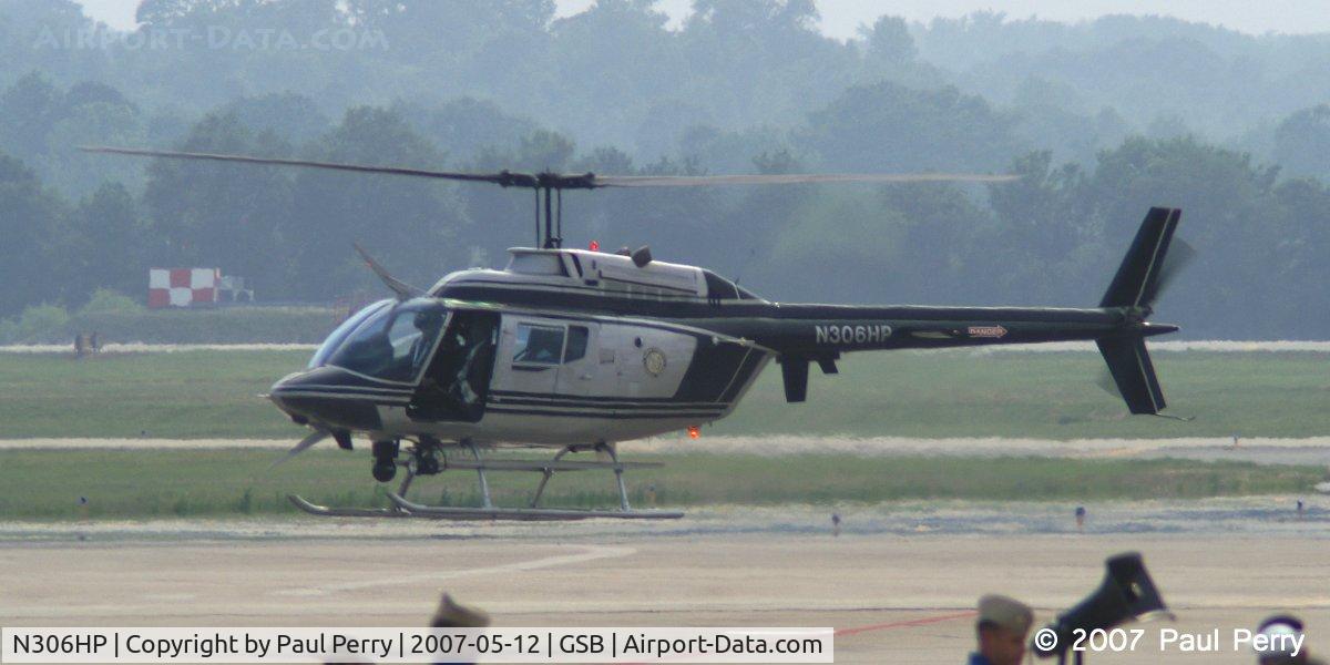 N306HP, Bell OH-58A C/N 71-20794, State Highway Patrol lifting off, perhaps headed to Kinston