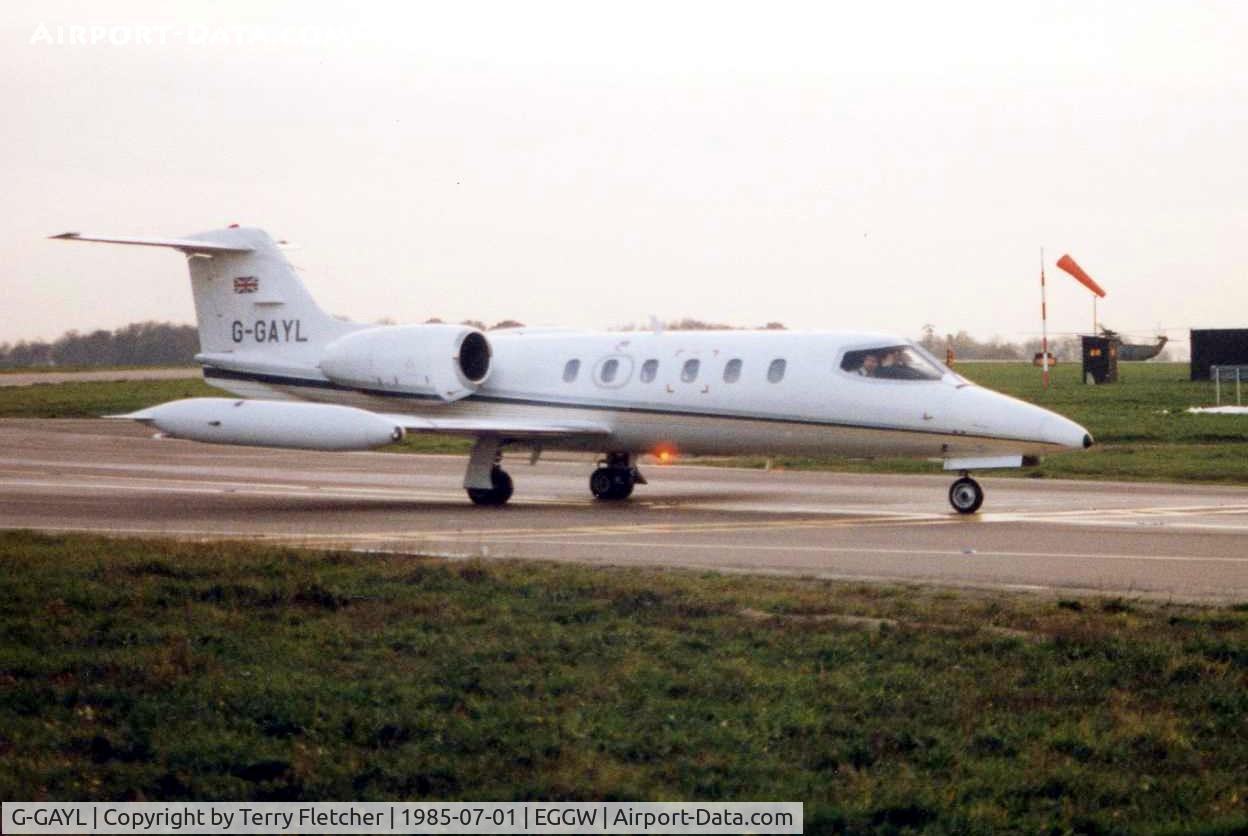 G-GAYL, 1981 Learjet 35A C/N 35A-429, Learjet 35A taxies in at Luton in 1985 - now registered as A6-RJH