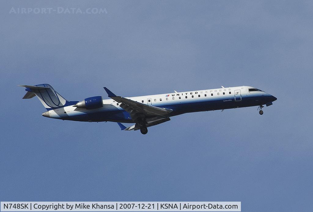 N748SK, 2005 Bombardier CRJ-700 (CL-600-2C10) Regional Jet C/N 10203, Bombardier CL-600-2C10 on a pretty day.