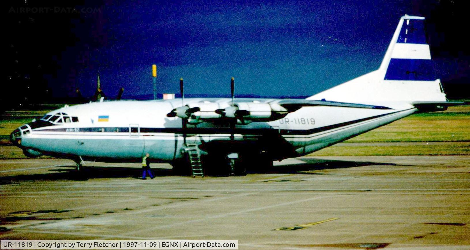 UR-11819, 1966 Antonov An-12BP C/N 6344009, Antonov 12 on a freight flight to East midlands  in 1997 - photographed just before the weather closed in