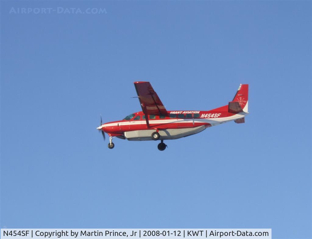 N454SF, 1999 Cessna 208B C/N 208B-0797, Grant Aviation Flying over Kwethluk, Ak
