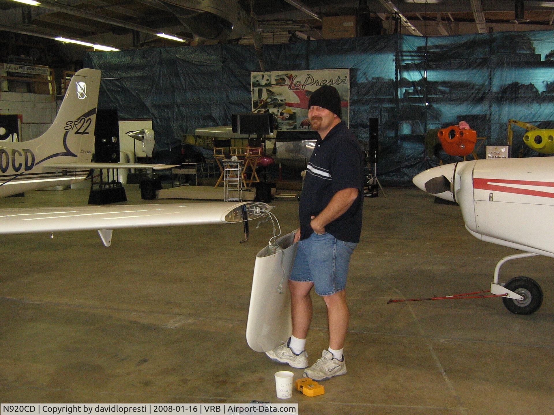 N920CD, 2002 Cirrus SR22 C/N 0279, Starting a new WingTip Mod - That is Travis our Manufacturing Coach removing the wing tip for an update to the LoPresti TriTip