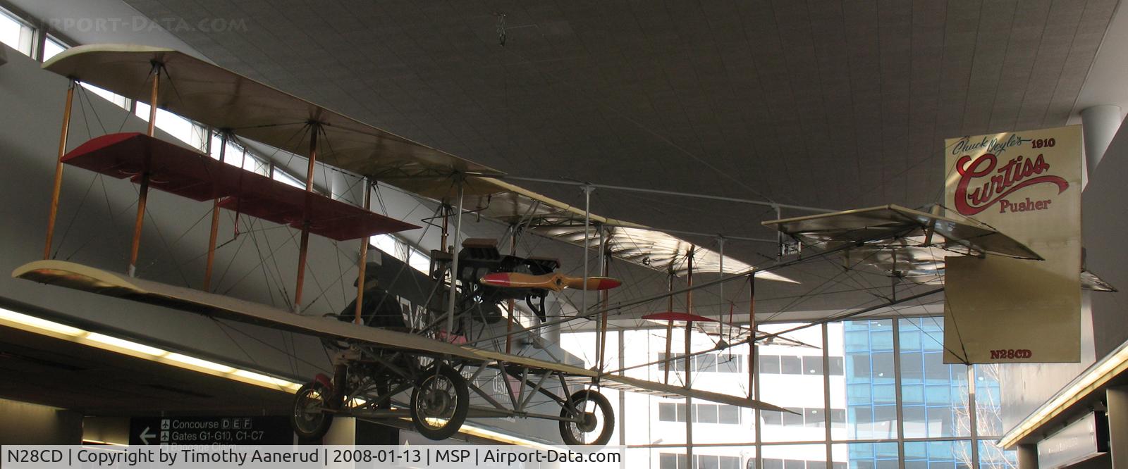 N28CD, 1964 Curtiss MR 1 C/N 1, Replica 1910 Curtis Pusher, near gate G12. Moved to Dakota Territory Air Museum, Minot, ND.