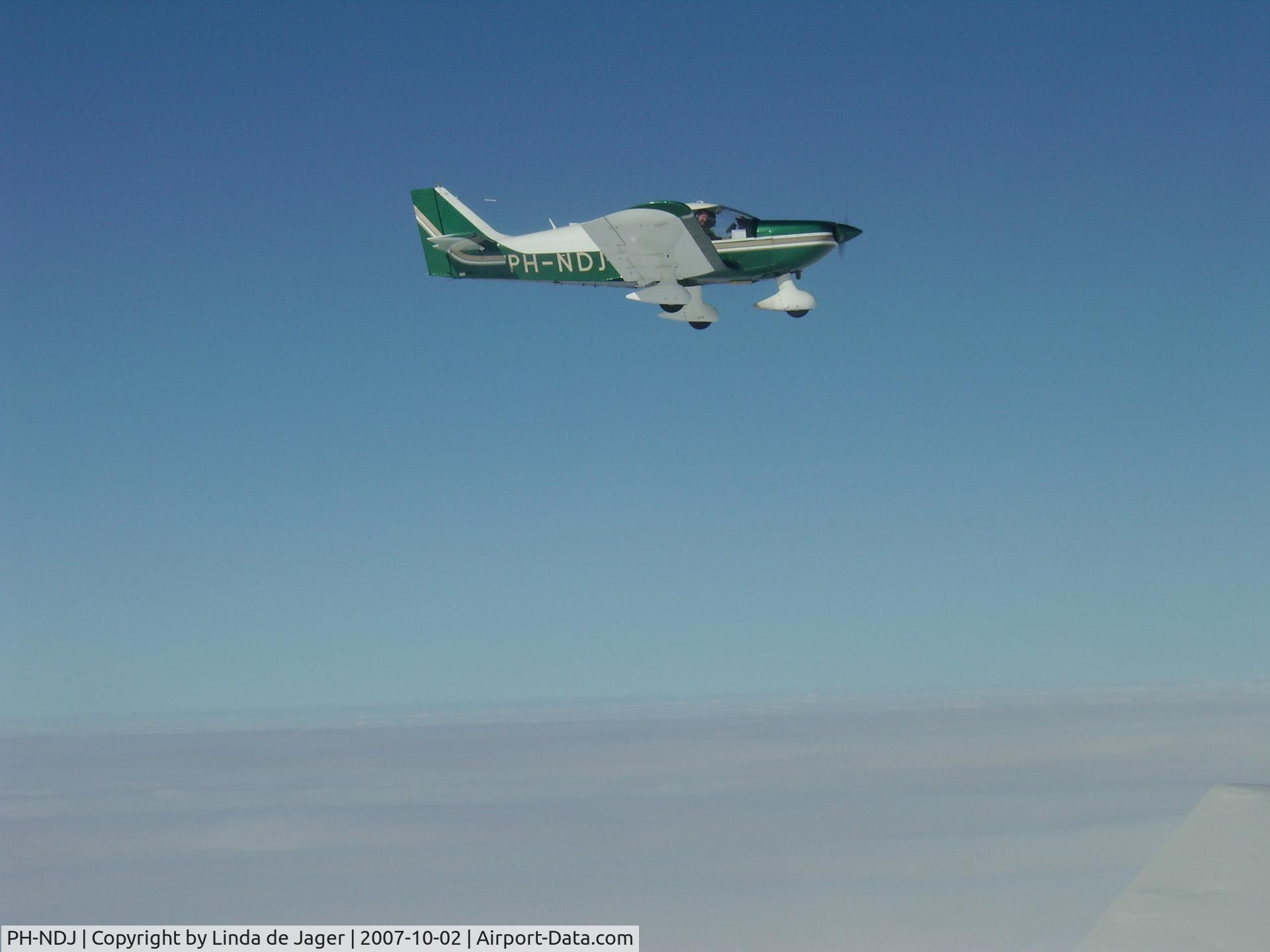 PH-NDJ, 1976 Robin HR-100-210 Safari C/N 210, Above clouds enroute from Lydd to Rotterdam