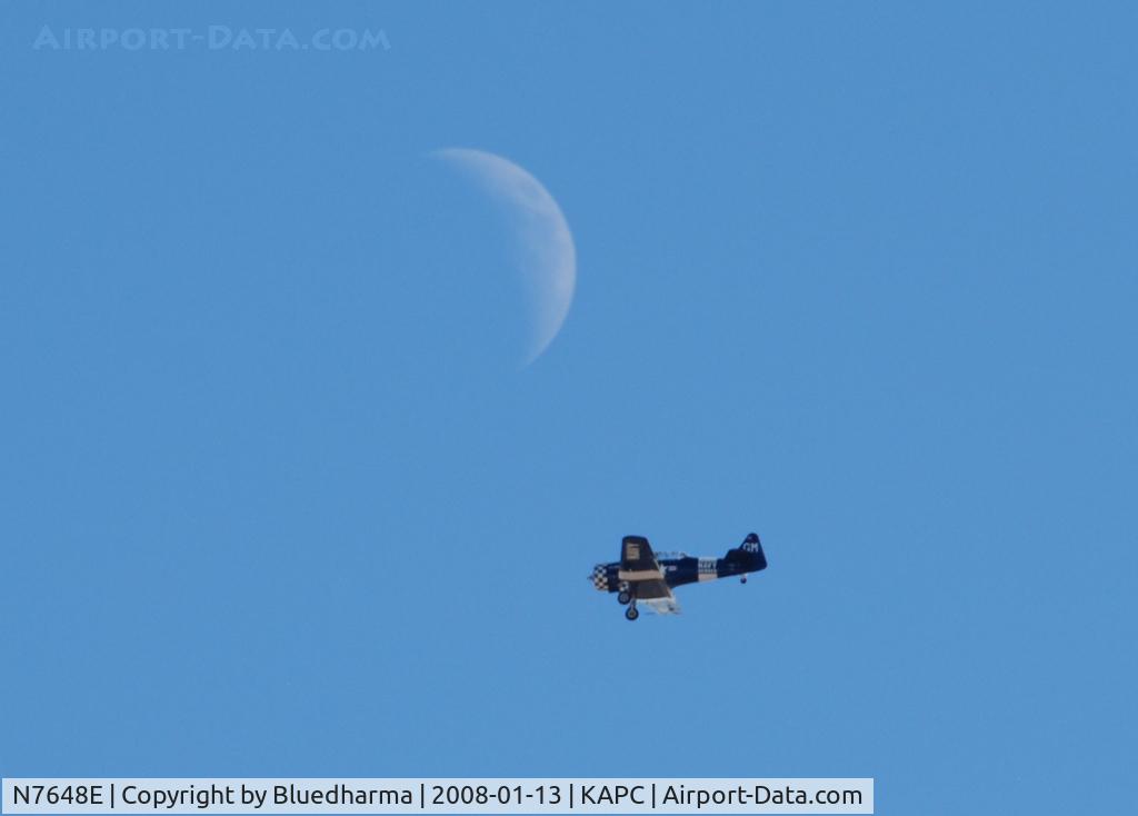 N7648E, 1942 North American SNJ-3 Texan C/N 78-6987, Trophy Hunter finds the moon.