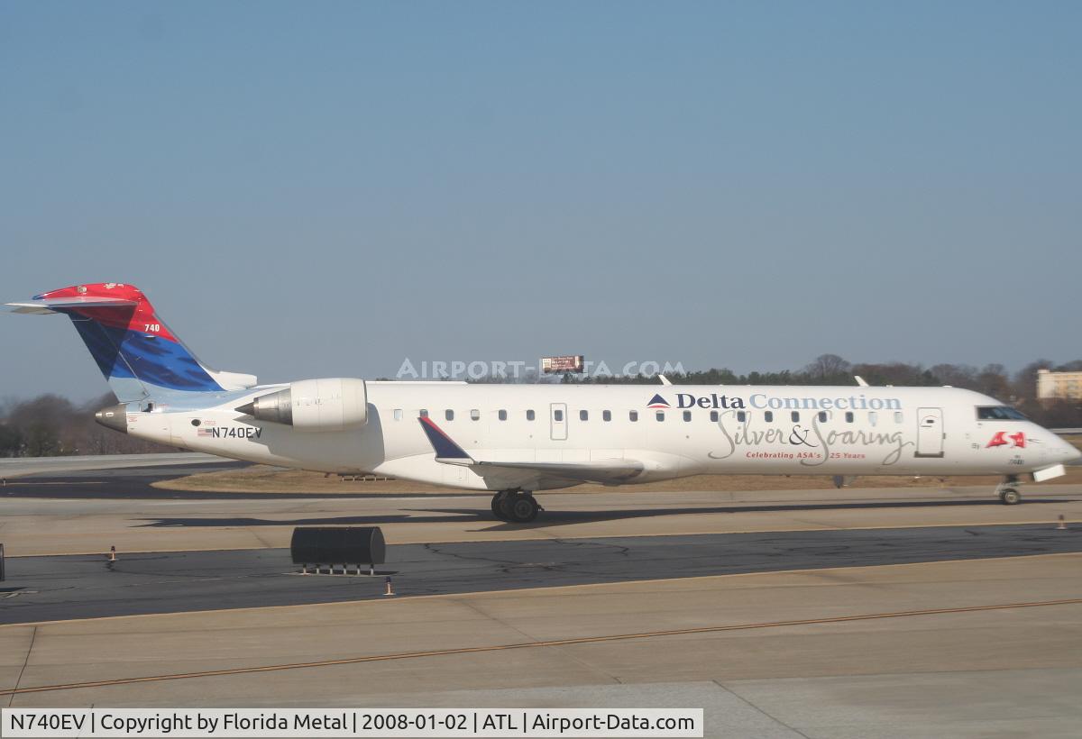 N740EV, 2004 Bombardier CRJ-701 (CL-600-2C10) Regional Jet C/N 10151, Silver and Soaring ASA