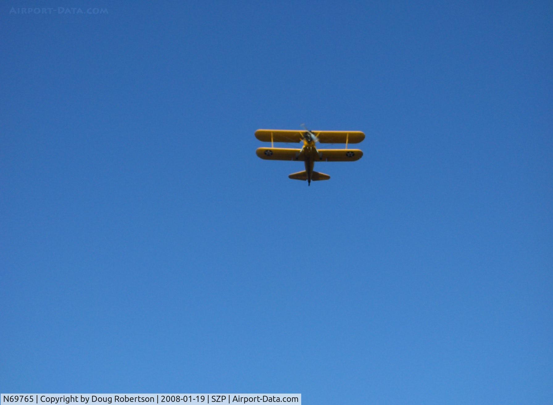 N69765, 1941 Boeing A75N1 (PT17) C/N 75-1044, 1941 Boeing Stearman A75N1 (PT-17 KAYDET) as N2S-1, Continental W670-5 220 Hp, takeoff climb Rwy 22