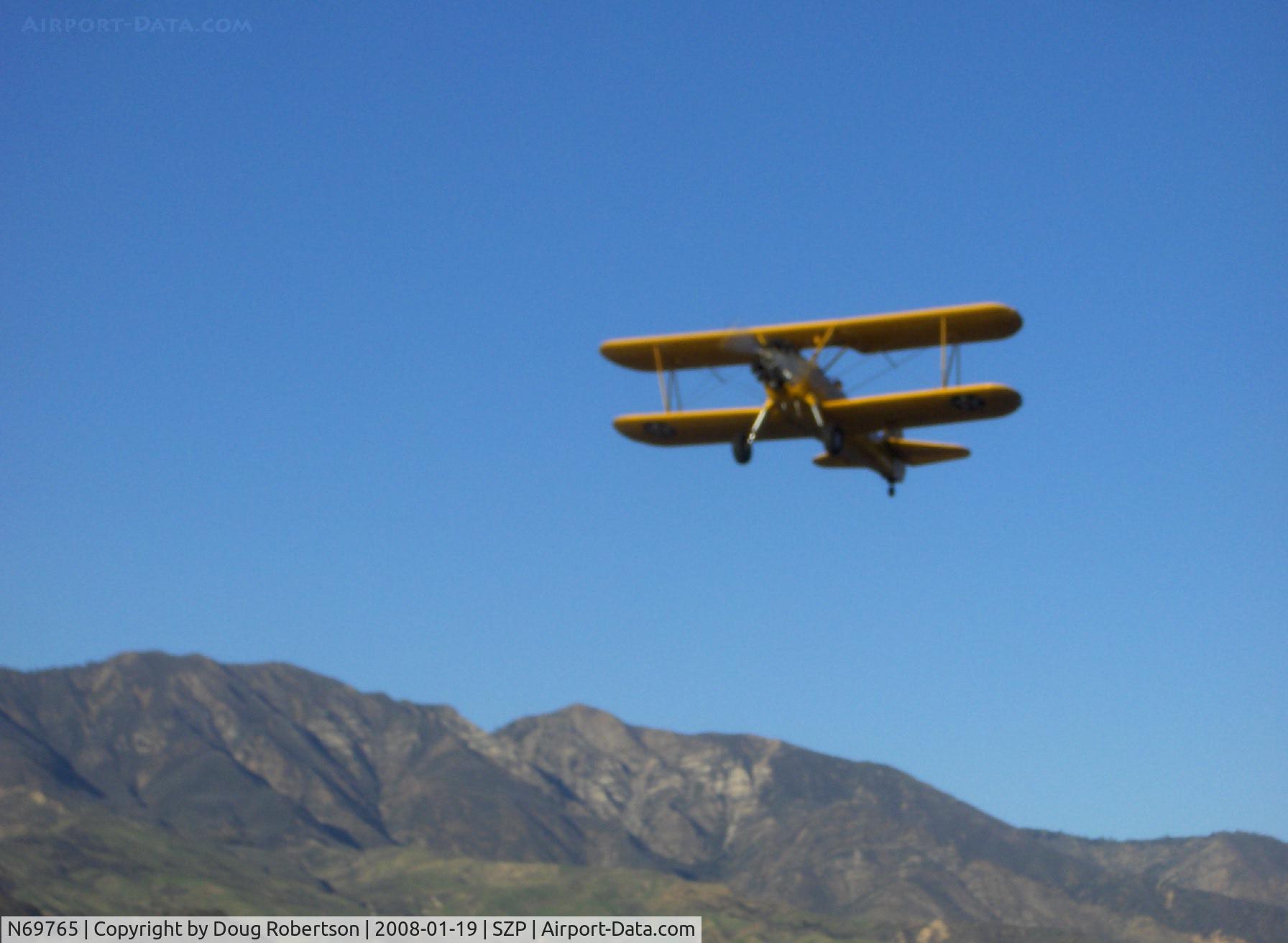N69765, 1941 Boeing A75N1 (PT17) C/N 75-1044, 1941 Boeing Stearman A75N1 (PT-17 KAYDET) as N2S-1, Continental W670-5 220 Hp, another takeoff climb Rwy 22