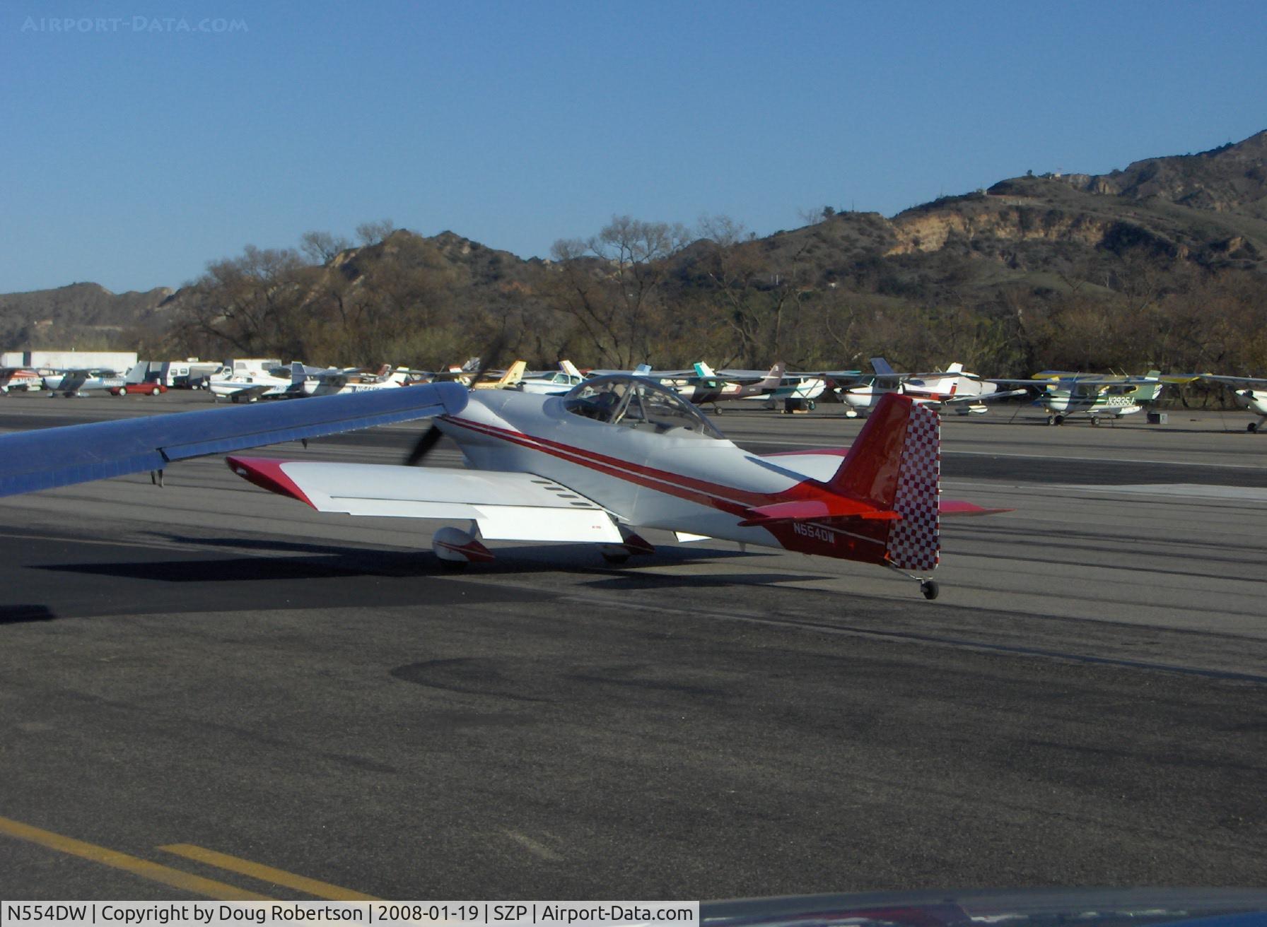 N554DW, 1999 Vans RV-4 C/N 554, 1999 Warne VAN's RV-4, Lycoming O-360-A1D 180 Hp, new checkered rudder, taxi to refuel