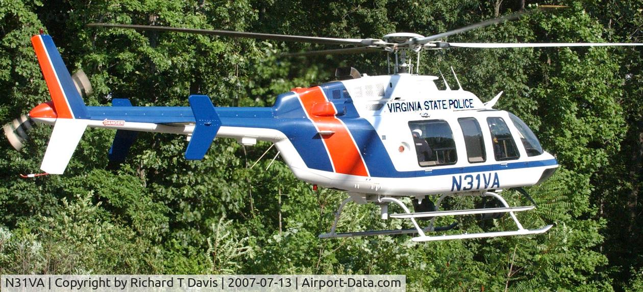 N31VA, 2000 Bell 407 C/N 53465, 2000 Bell 407 Virginia State Police leaving wreck scene along the Danville Va. Expressway with patients aboard  enroute to hospital.