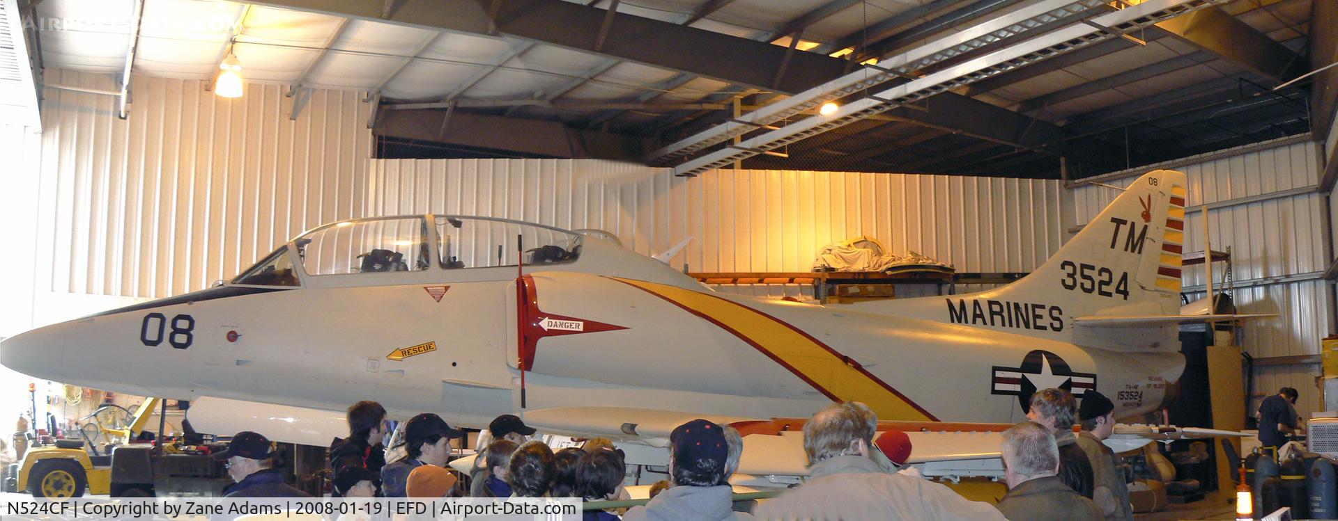 N524CF, 1967 Douglas TA-4F Skyhawk C/N 13590, Collings Foundation TA-4J in the hanger at Ellington Field - PS photomerge
