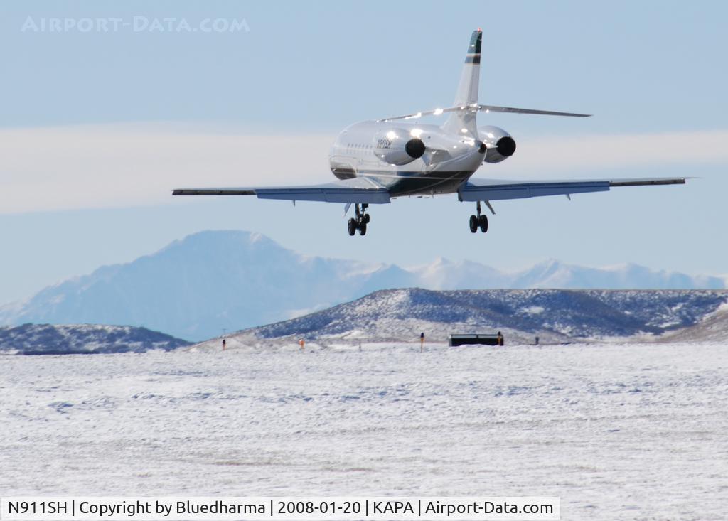 N911SH, 2000 Dassault Falcon 2000 C/N 125, Approach to 17L with Pikes Peak in the distance.
