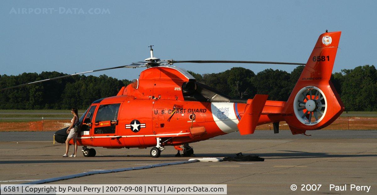 6581, 1988 Aerospatiale HH-65C Dolphin C/N 6279, Late afternoon sun turning up the intensity on the Orange