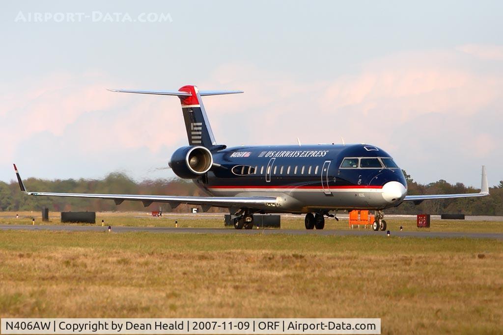N406AW, 2000 Bombardier CRJ-200LR (CL-600-2B19) C/N 7402, Air Wisconsin (US Airways Express) N406AW (FLT AWI3673) taxiing to RWY 5 for departure to Charlotte/Douglas Int'l (KCLT).