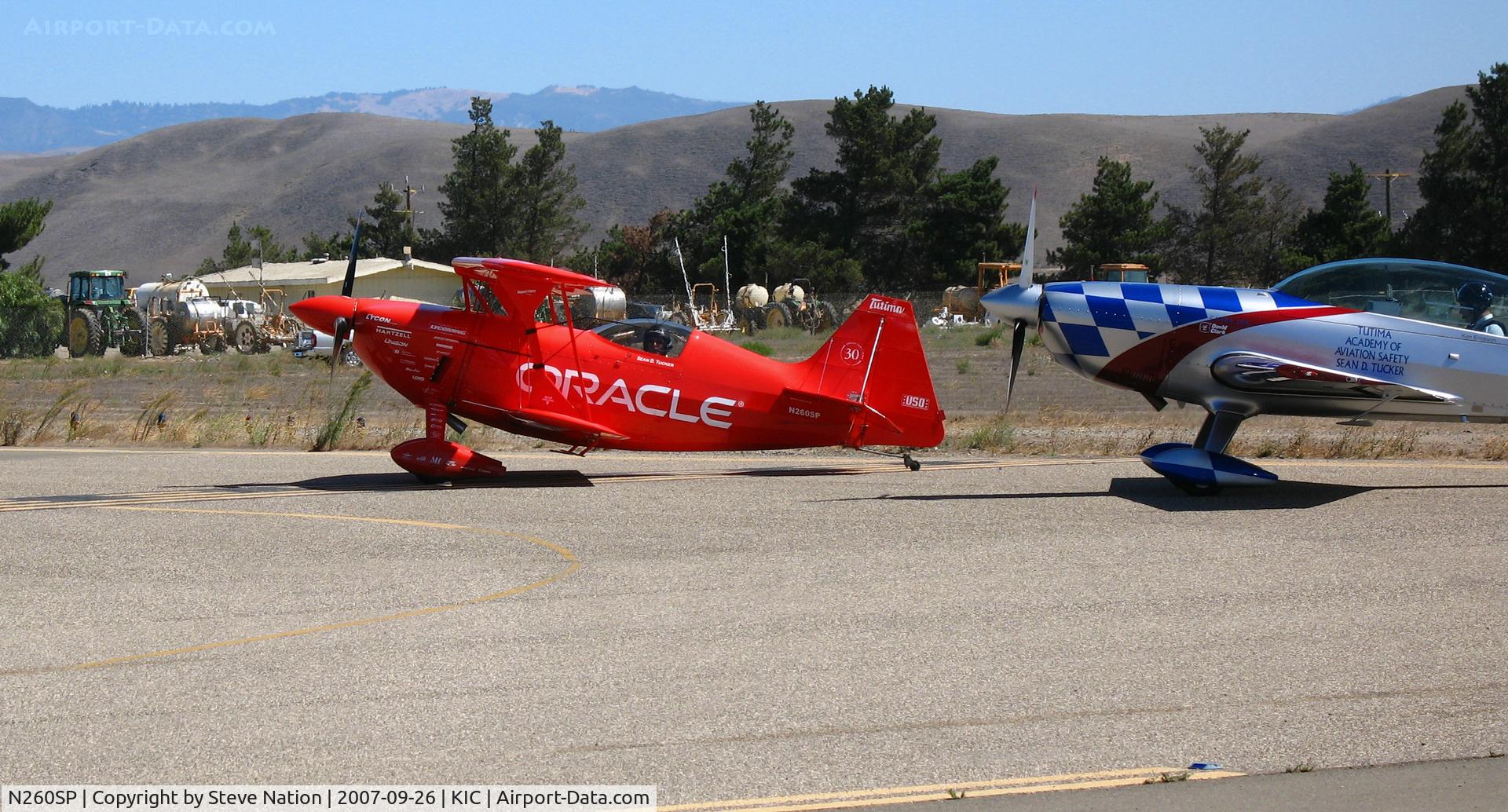 N260SP, 1981 Pitts S-2S Special C/N 1114C, Vibrantly-painted ORACLE/Tutima 1981 Oliver Steven R PITTS S-2S running-up engine @ Mesa Del rey (King City) Municipal Airport, CA