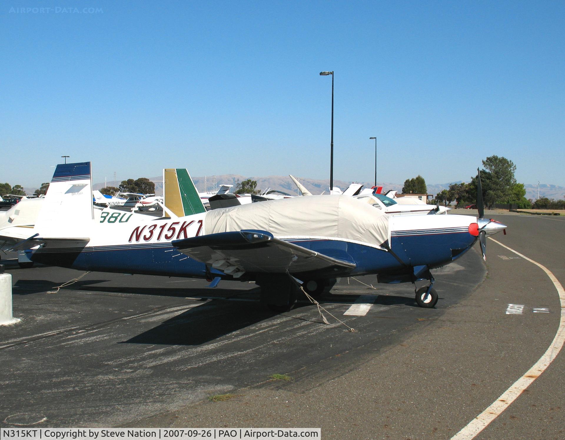 N315KT, 2001 Mooney M20M Bravo C/N 27-0316, 2001 Mooney M20M under cover @ Palo Alto Municipal Airport, CA