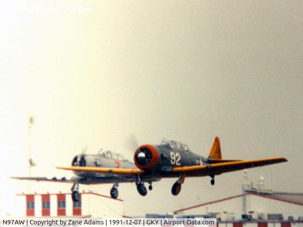 N97AW, 1940 North American AT-6 Harvard II C/N 66-2703, Departing Arlington (along with N9065Z) for 50th Anniversary Pearl Harbor Day Flyover 1991