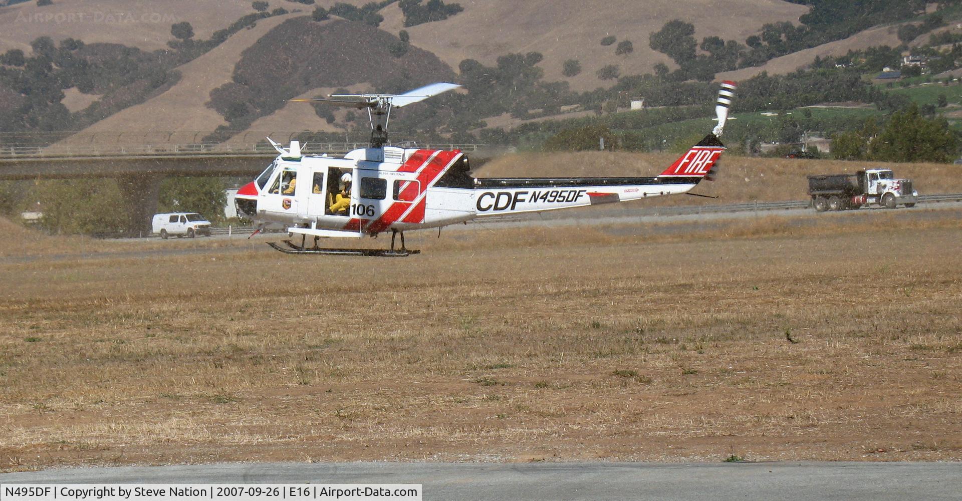 N495DF, Bell EH-1H C/N 12218, CALFIRE/CDF Bell EH-1H/Chopper #106 in hover @ South County Airport (Morgan Hill), CA