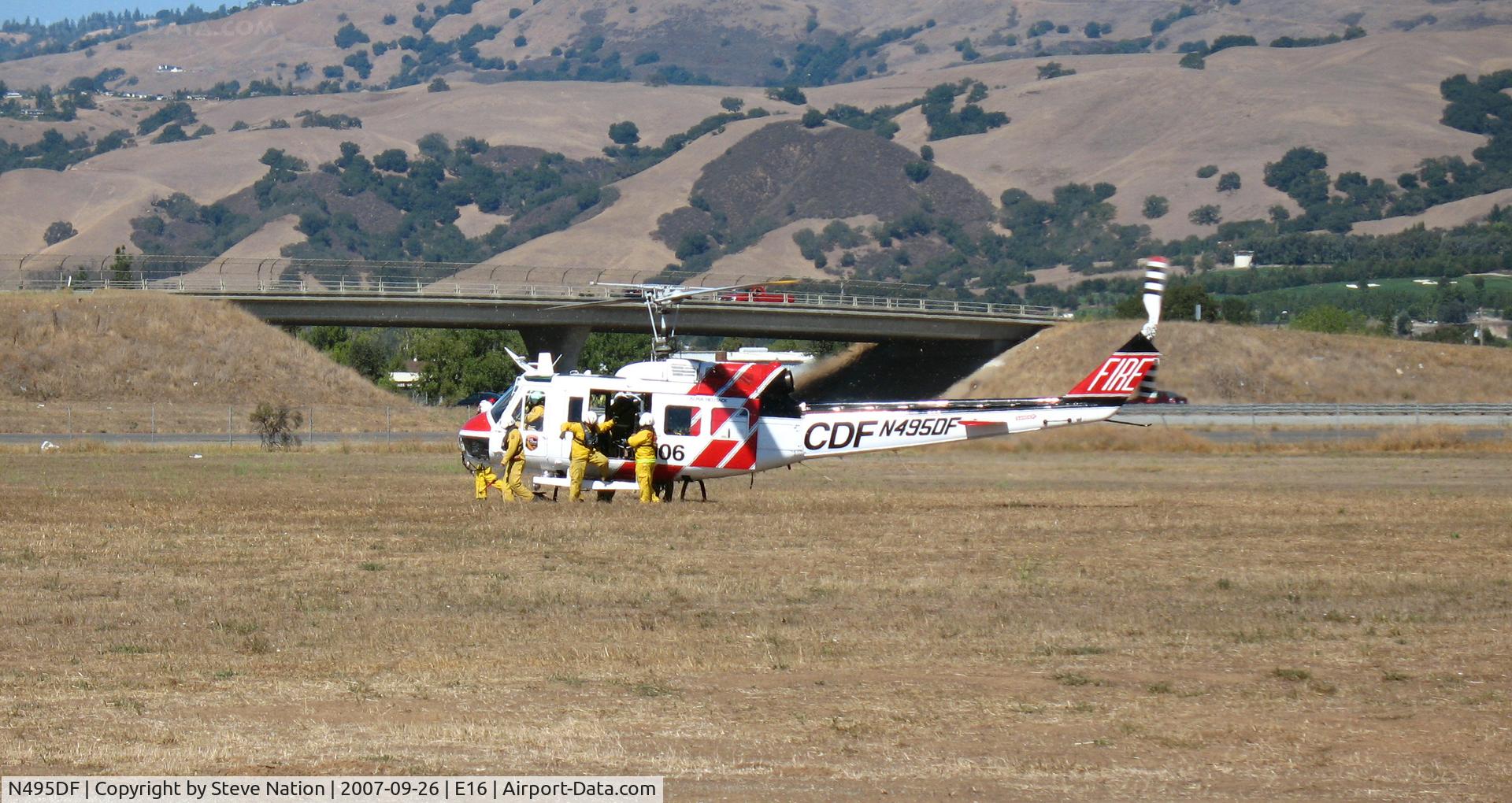 N495DF, Bell EH-1H C/N 12218, CALFIRE/CDF Bell EH-1H/Chopper #106 taking a break @ South County Airport (Morgan Hill), CA
