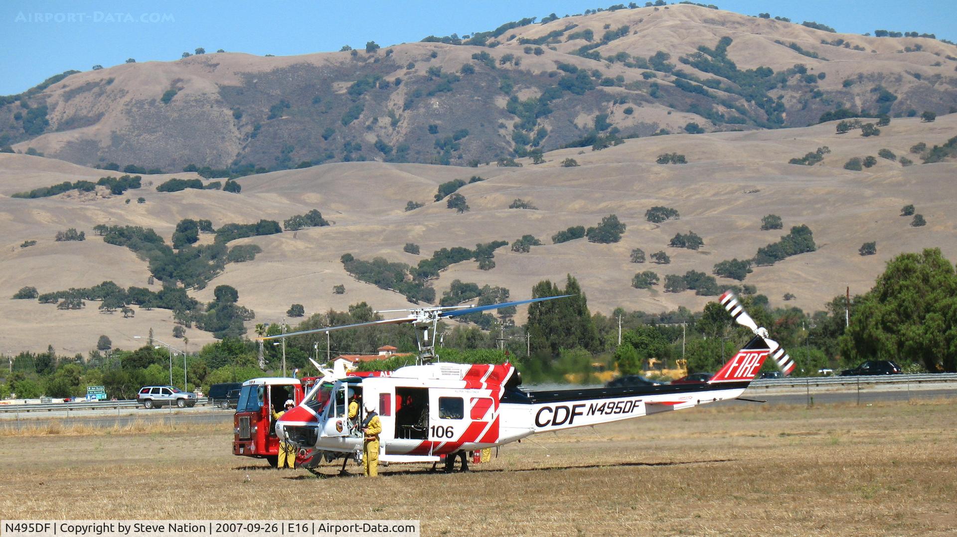 N495DF, Bell EH-1H C/N 12218, CALFIRE/CDF Bell EH-1H/Chopper #106 taking a break @ South County Airport (Morgan Hill), CA