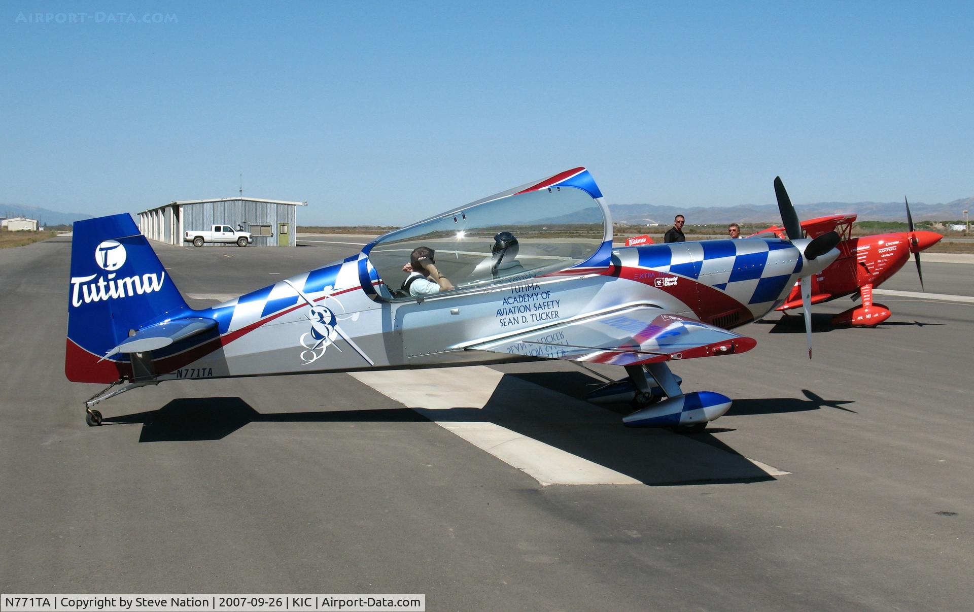 N771TA, 2006 Extra EA-300/L C/N 1231, Strapping-in to (Team Oracle) Tutima 2006 Extra Flugzeugbau Gmbh EA 300/L @ Mesa del Rey (King City) Airport, CA