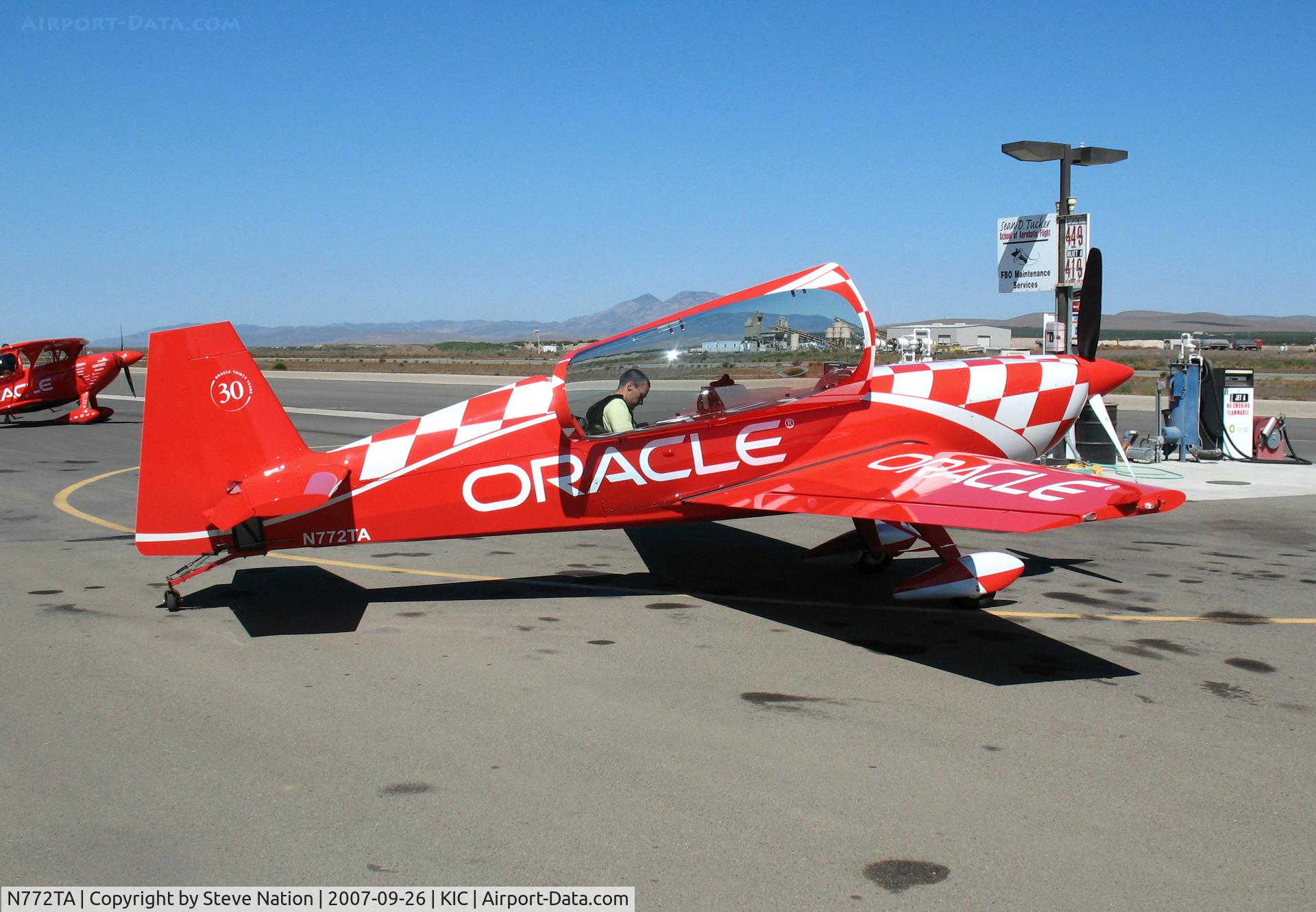 N772TA, 2007 Extra EA-300/L C/N 1260, Strapping-in to brightly painted (Team) ORACLE 2006 Extra Flugzeugbau Gmbh EA 300/L @ Mesa del Rey (King City) Airport, CA