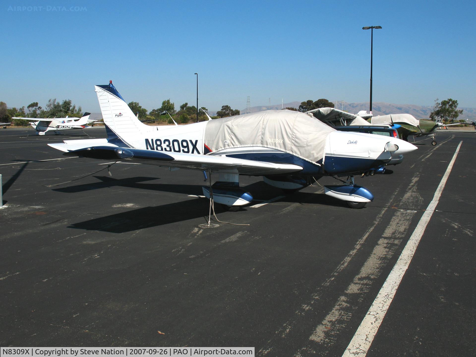 N8309X, Piper PA-28-236 Dakota C/N 28-8111034, Piper PA-28-236 (with cover) @ Palo Alto Airport, CA