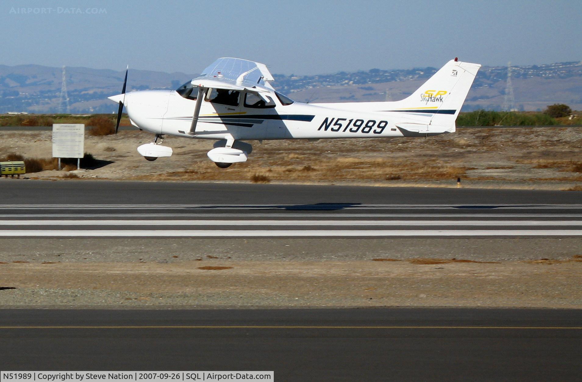 N51989, 2002 Cessna 172S C/N 172S9095, 2002 Cessna 172S on final approach (crosswind blowing!) @ San Carlos Airport, CA