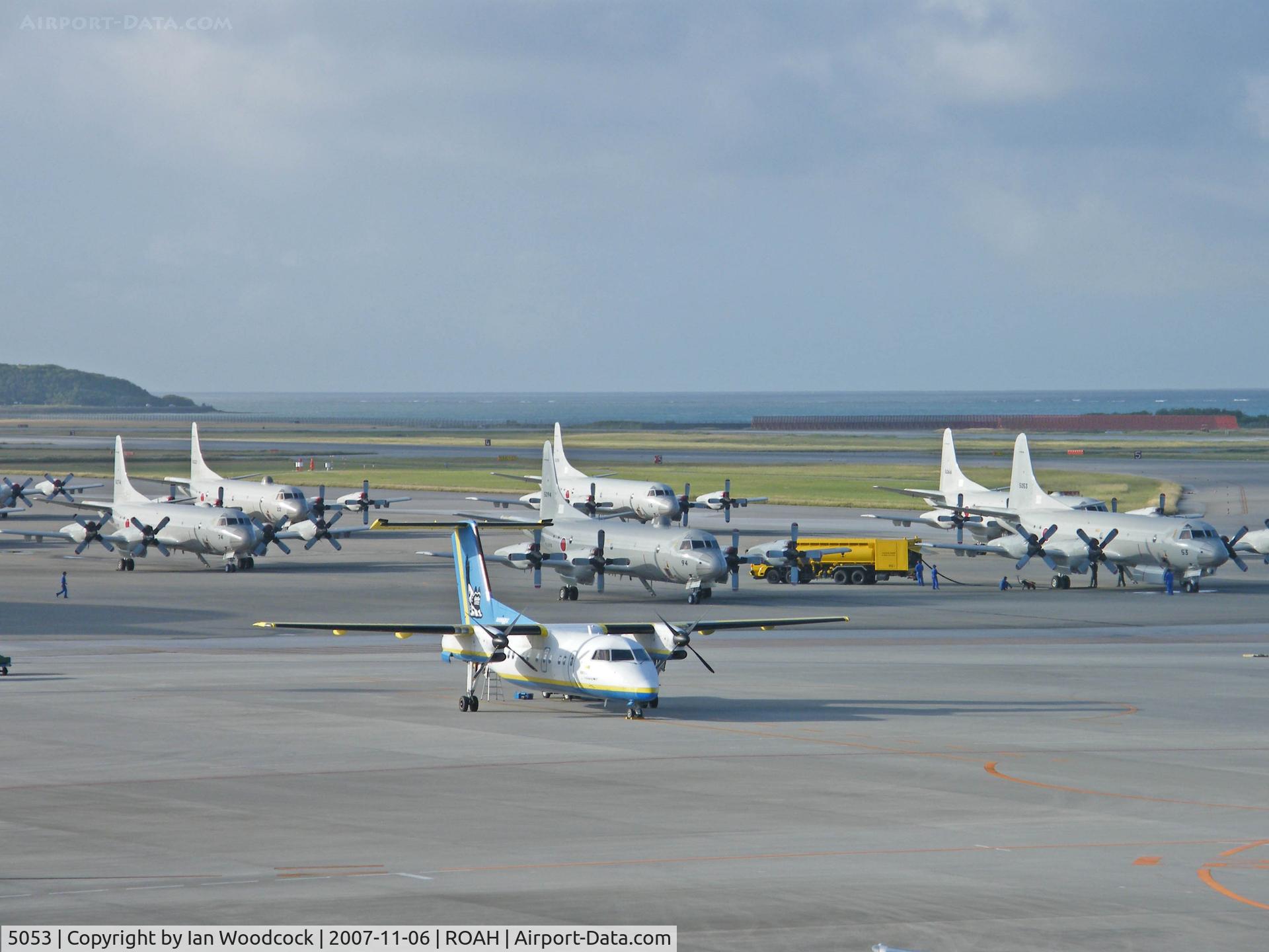 5053, 1989 Kawasaki (Lockheed) P-3C-III Orion C/N 9050, Lockheed P-3C/Heads a gaggle on the Naha ramp.