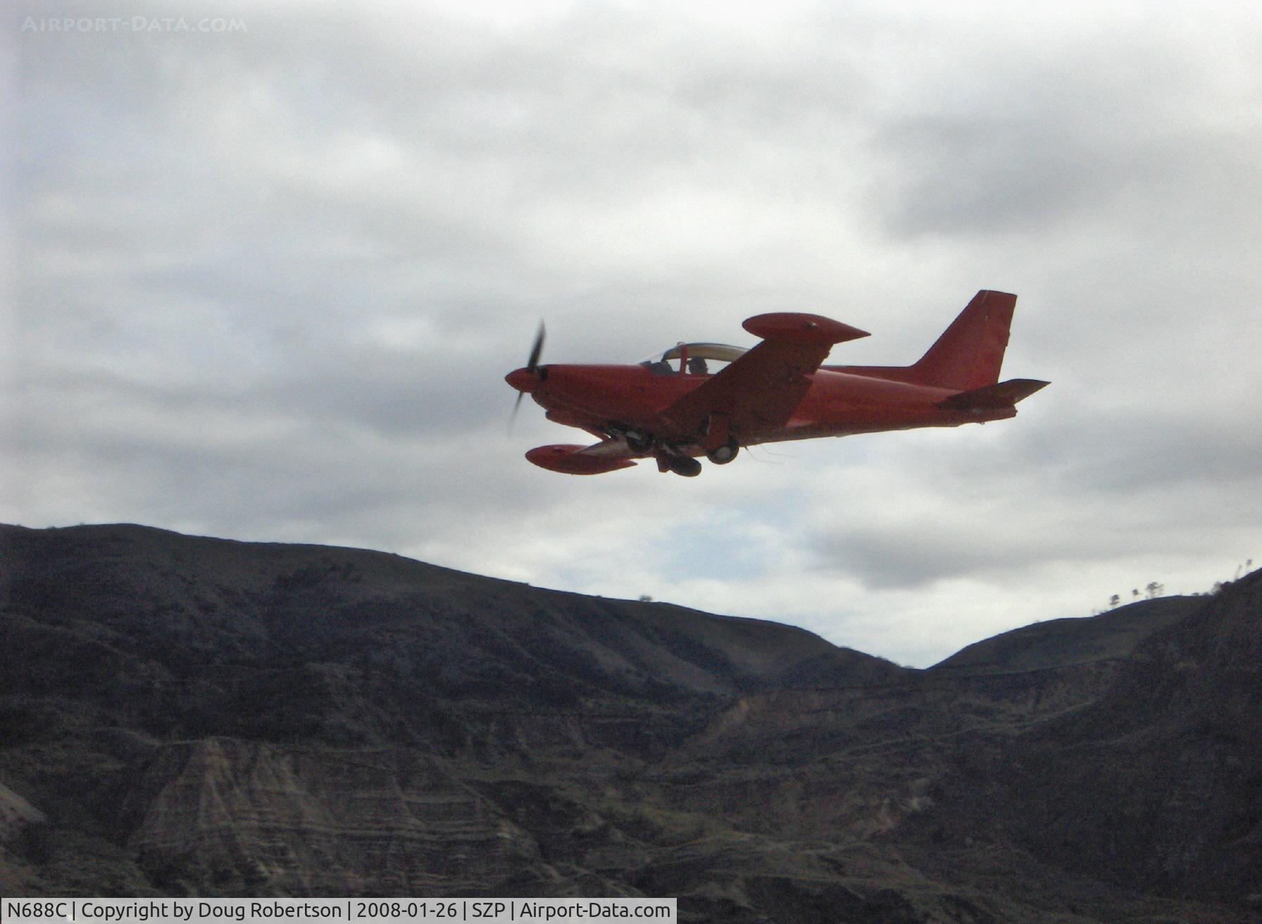 N688C, SIAI-Marchetti SF-260C C/N 466/37-004, SIAI-Marchetti SF.260C, Lycoming O-540-E4A5 260 Hp, takeoff climb Rwy 04, gear coming up