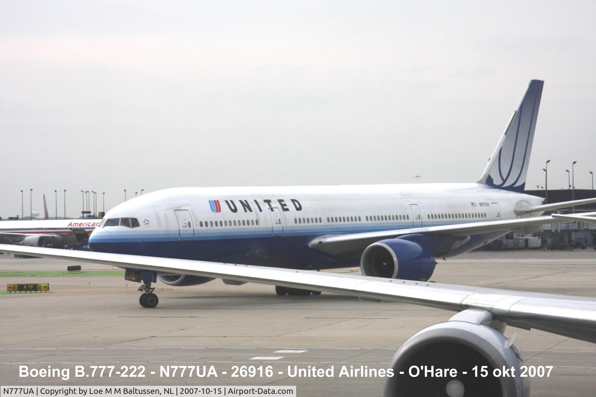 N777UA, 1995 Boeing 777-222 C/N 26916, Passing Therminal-2 Chicago O'Hare Int'l