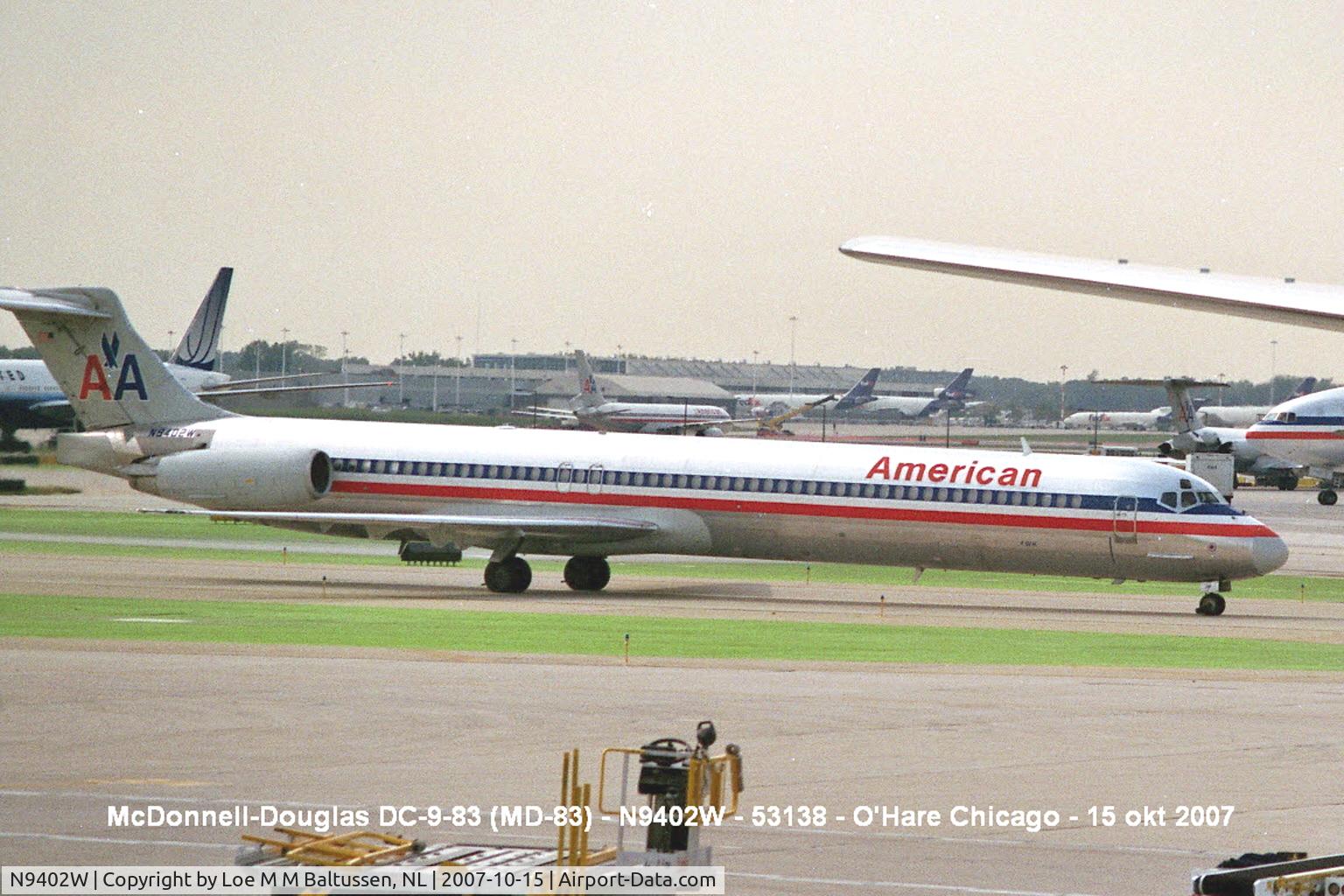 N9402W, 1992 McDonnell Douglas MD-83 (DC-9-83) C/N 53138, A long Niner passing Terminal 2, O'Hare, a small Grumman F-15 Wildcat (BuNo 12320) attracks more attention than the big Jumbo's ouside
