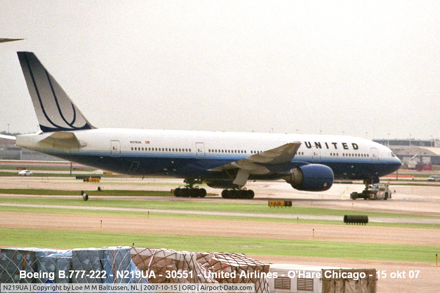N219UA, 2001 Boeing 777-222 C/N 30551, Passing by Terminal-2