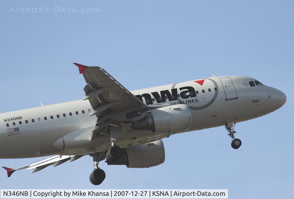 N346NB, 2002 Airbus A319-114 C/N 1796, NWA A319 lifting off with a heavy load