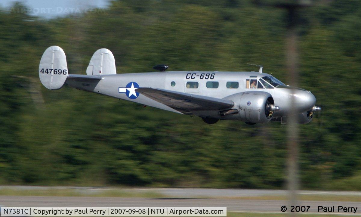 N7381C, 1944 Beech C18S C/N 8104, Streaking in over the runway