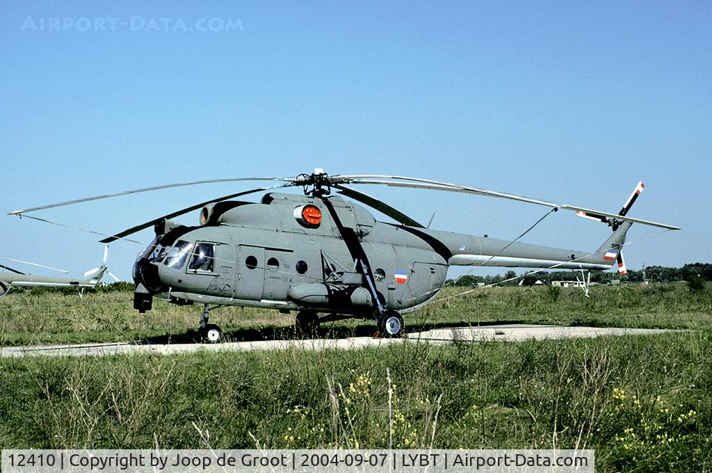 12410, Mil Mi-8 Hip C/N 10977, This Mi-8 is heavily modified: over and underneath the cockpit several modifications can be seen.