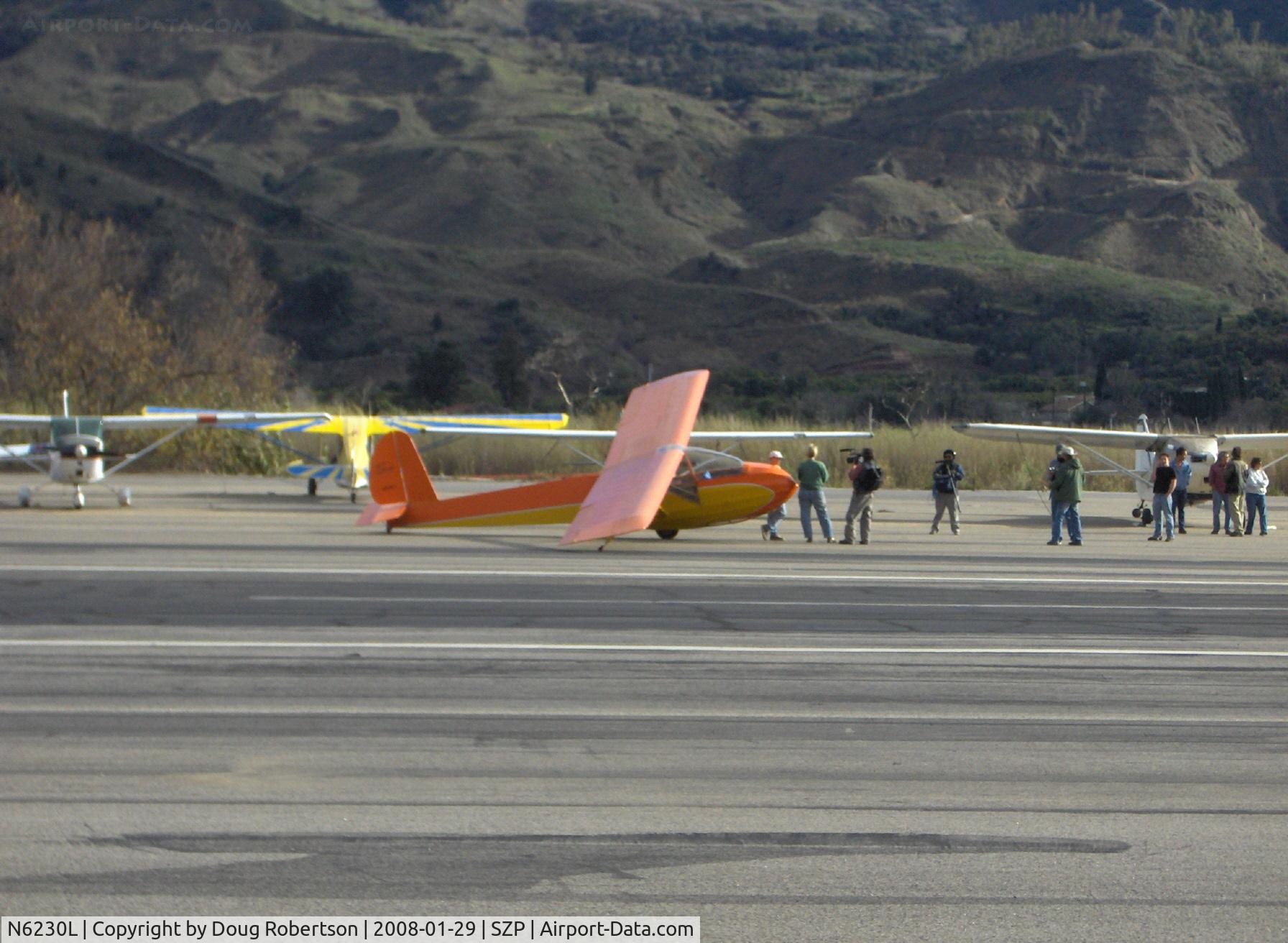 N6230L, 1964 Schweizer SGU 2-22E C/N 182, 1964 Schweizer SGU 2-22E Glider landing roll stopped, debrief and photo/TV video coverage of solo endorsement flight with Glider CFI