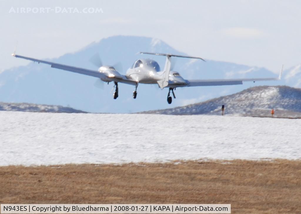 N943ES, 2006 Diamond DA-42 Twin Star C/N 42.AC033, Landing on 17L with Pikes Peak in the Distance.