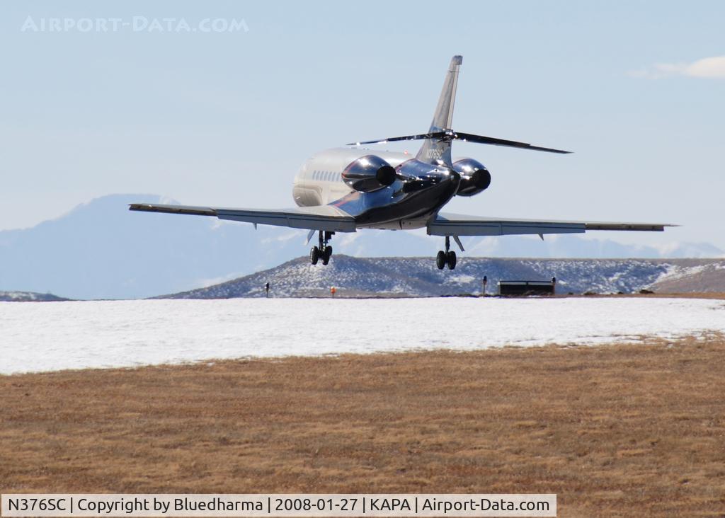 N376SC, 2005 Dassault Falcon 2000EX C/N 57, Approach to 17L. Pikes Peak in the distance.