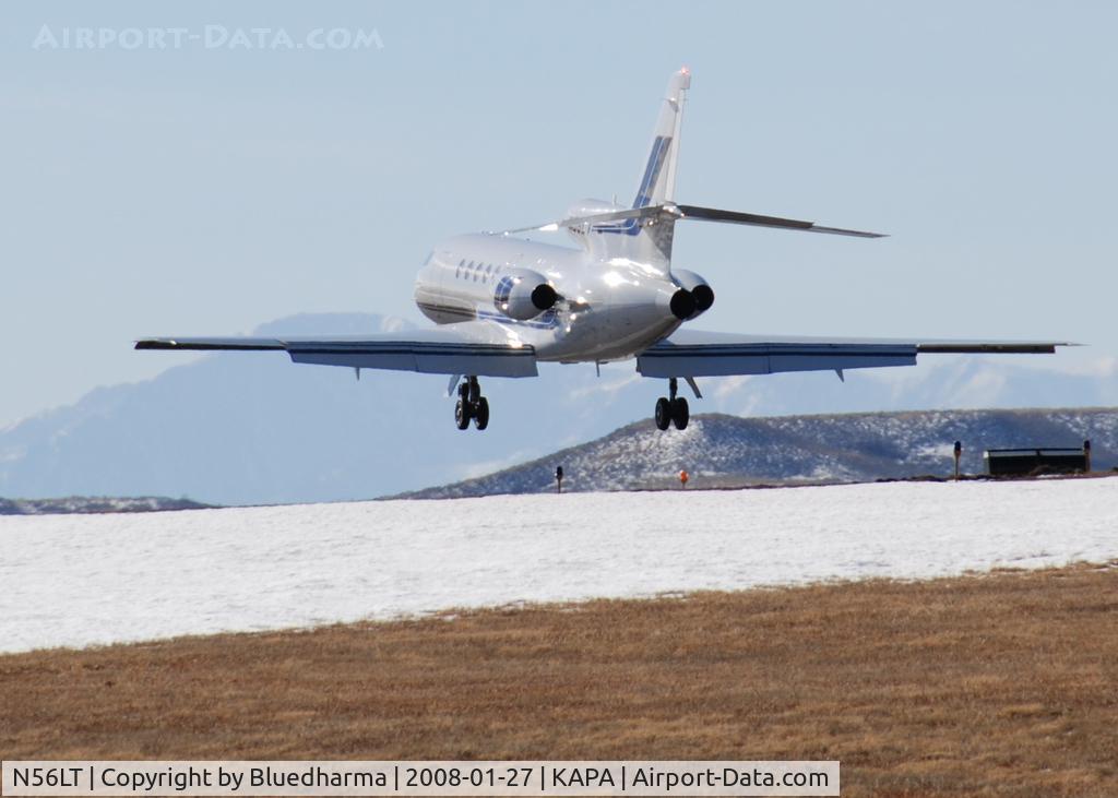 N56LT, 1980 Dassault Falcon 50 C/N 21, Landing on 17L. Pikes Peak in the distance.