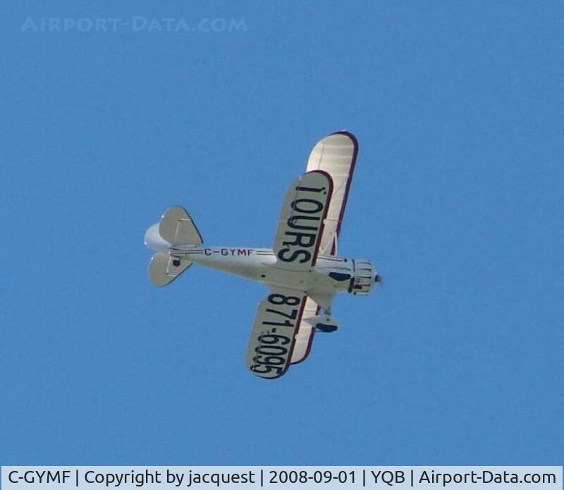 C-GYMF, 1996 Waco YMF C/N F5C068, Passing nearby over the River
